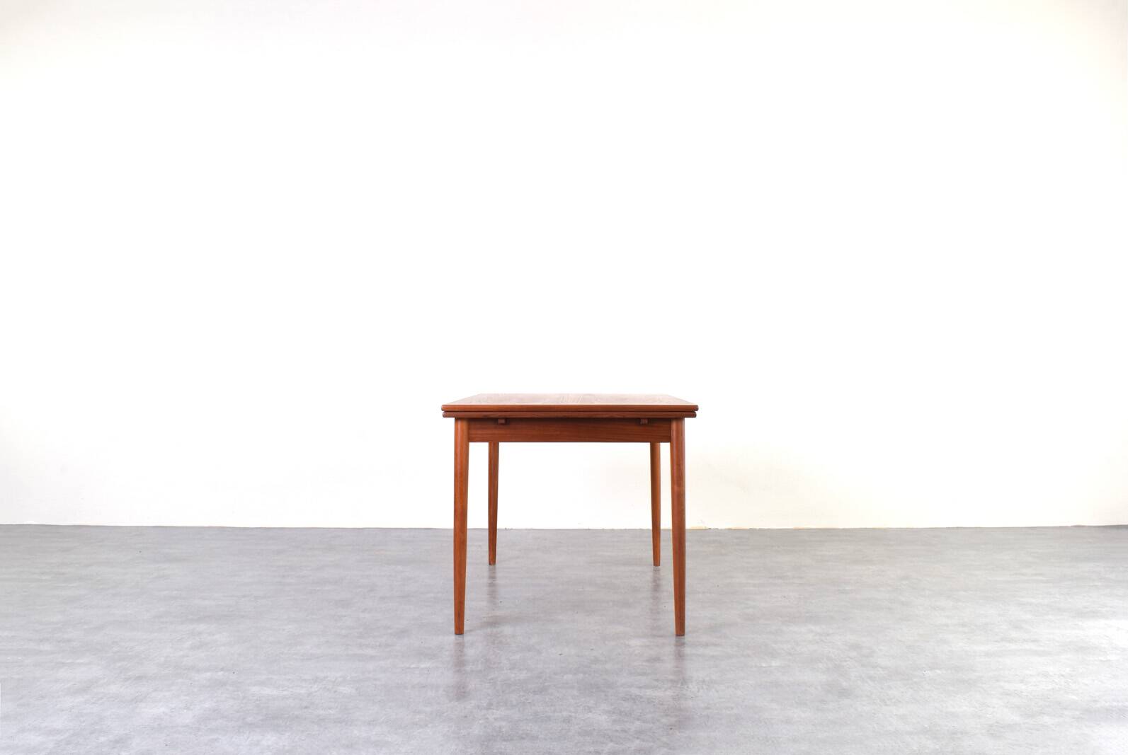 Mid-century Danish teak extendable dining table, 1960s.