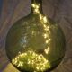 Demijohn old transparent green, estimated capacity around 12 to 15L