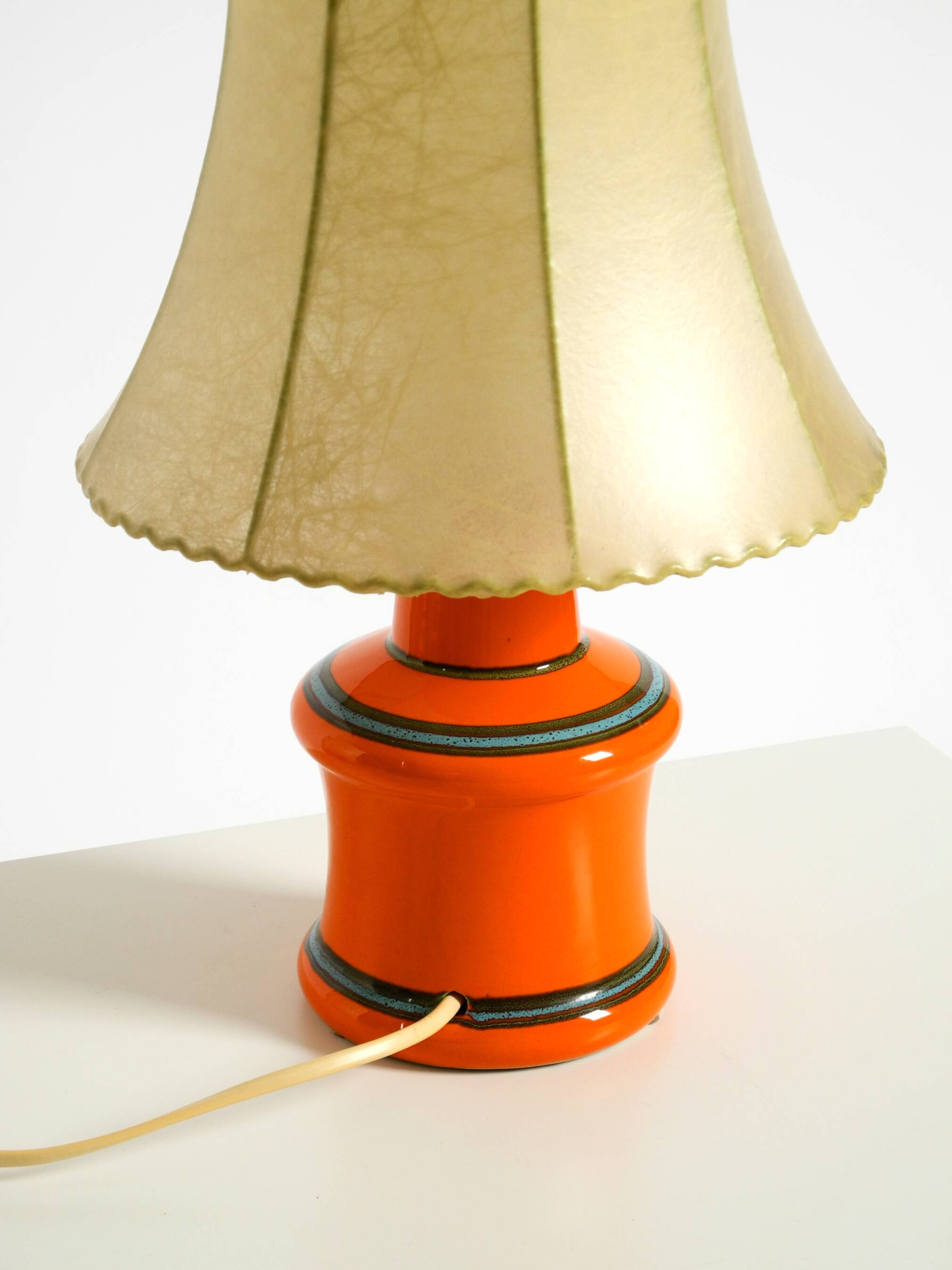 Beautiful 1960s orange ceramic table lamp with Cocoon shade | Made in Italy