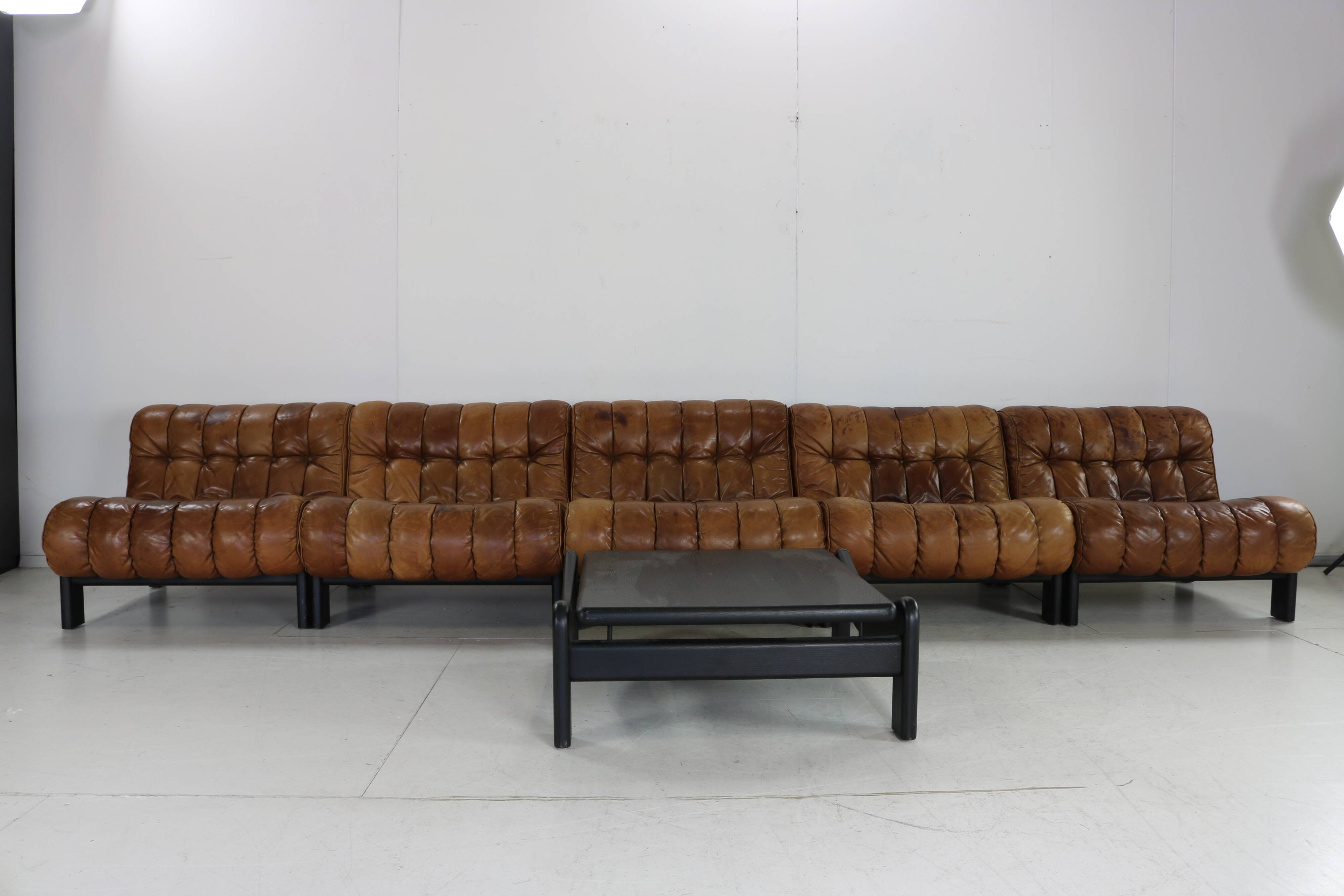 70s living room set in cognac brown leather with black wenge wood frame