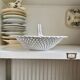 Oval basket in white glazed earthenware