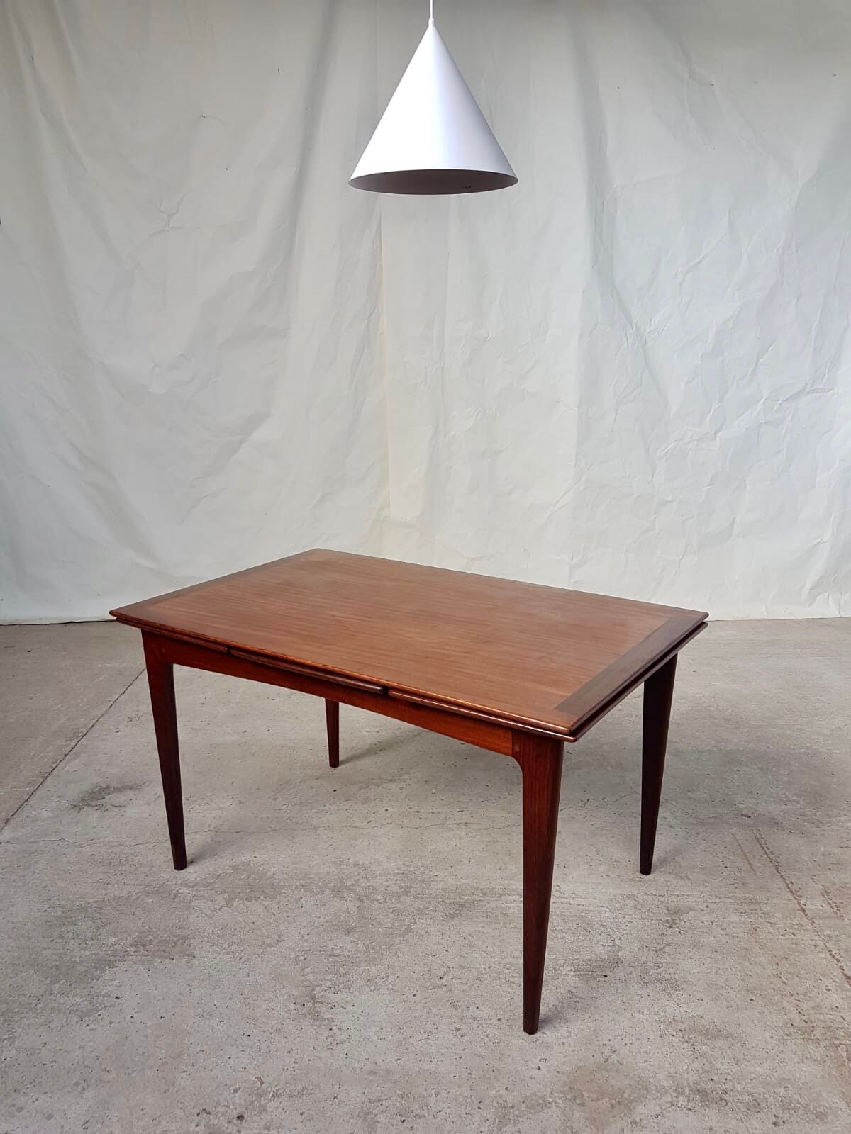 Teak extending dining table by Younger