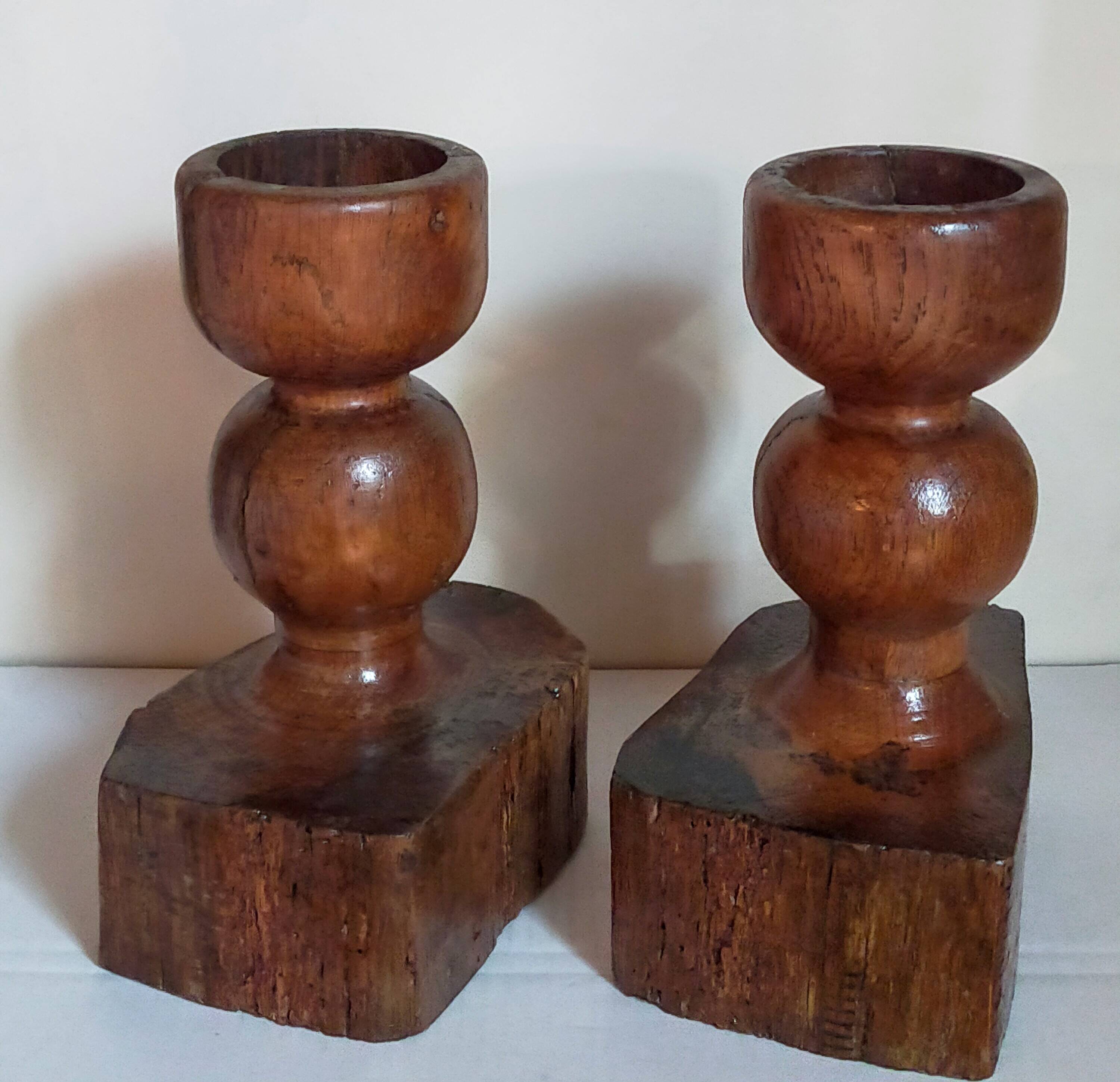 Pair of old brutalist turned solid wood candlesticks