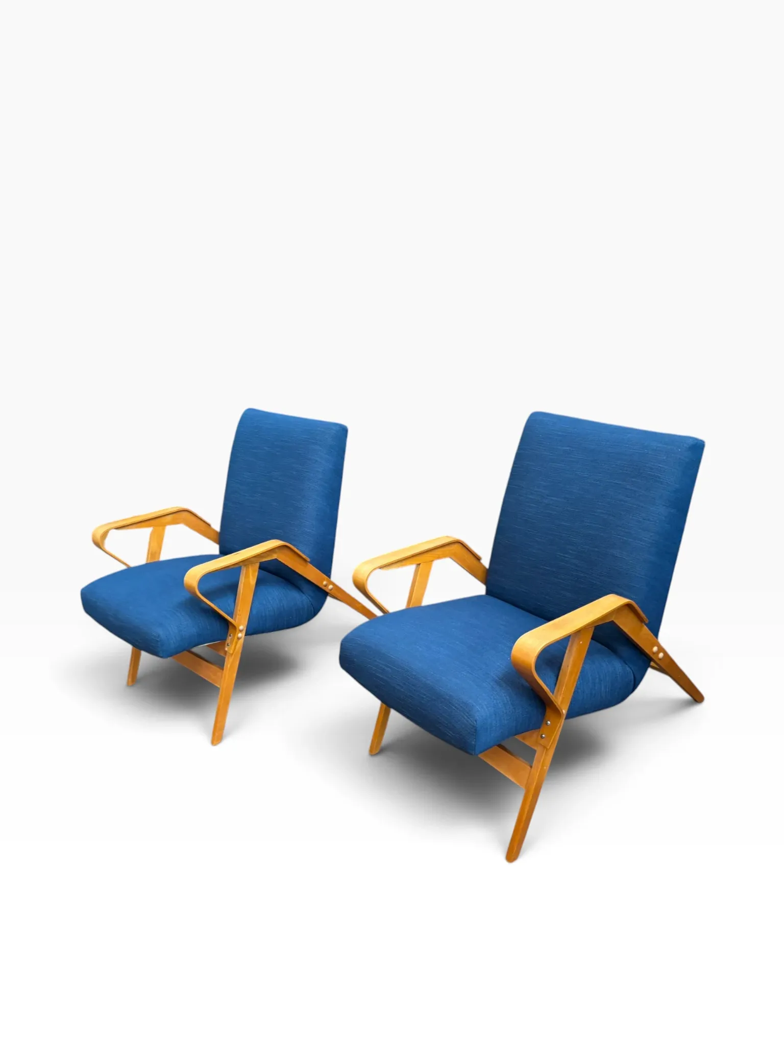 Set of 2 blue lounge chairs restored by František Jirák for Tatra Nabytok.