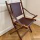 Lot de trois chaises d’officier pliantes bois et cuir