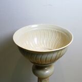 Planter on foot in enamelled metal