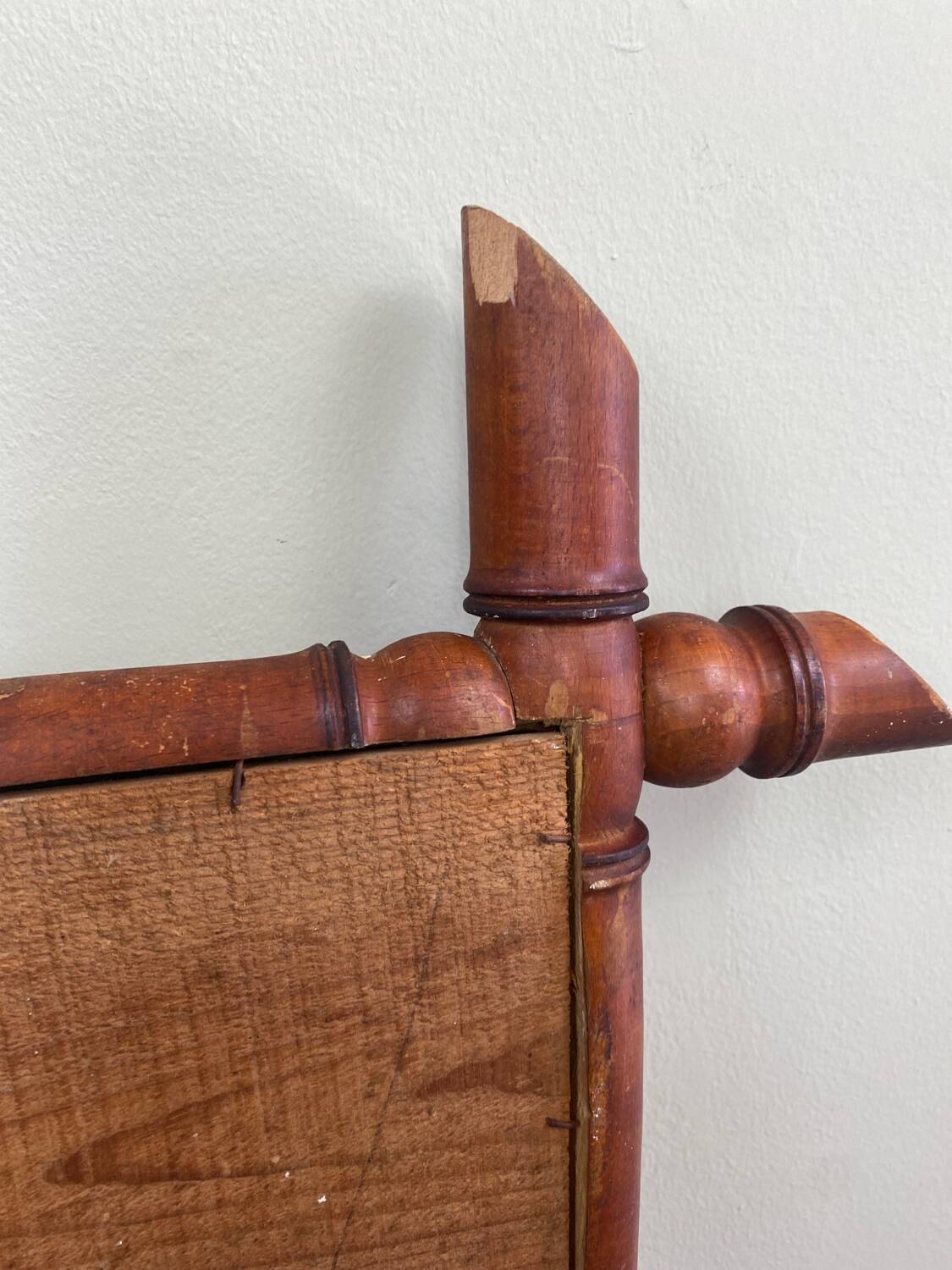 Antique turned wooden mirror