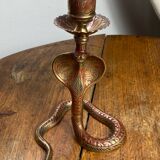 Chiseled brass cobra candlestick
