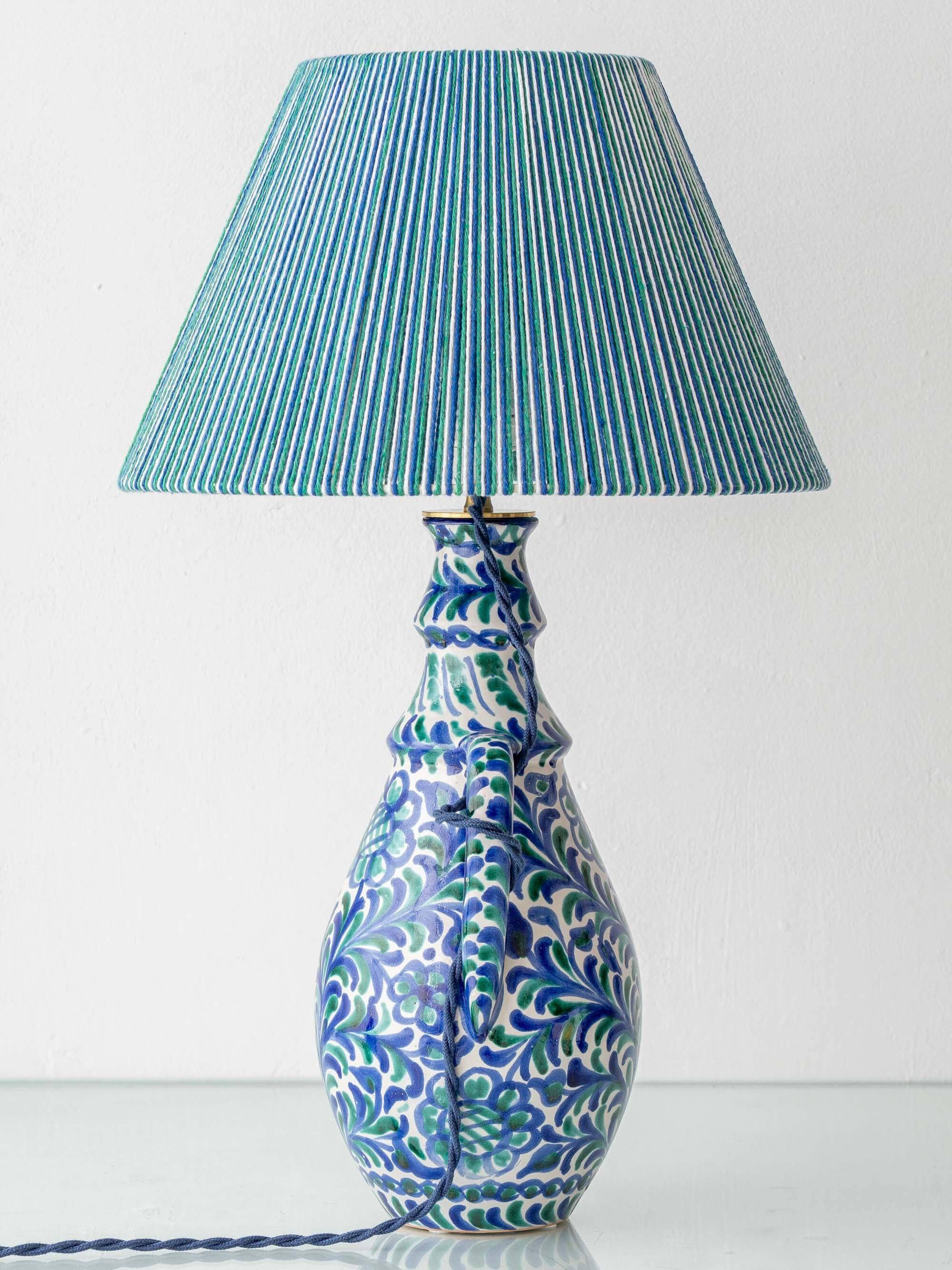 Fajalauza ceramic table lamp with hand-woven shade, Granada, Spain.