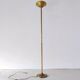 Halogen floor lamp in golden brass