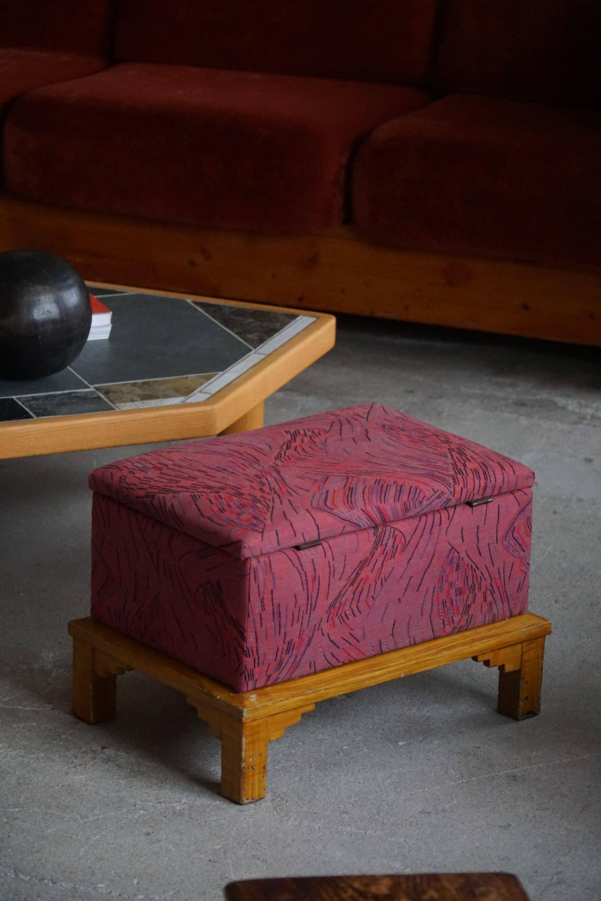 Sculptural French Art Deco stool with storage, reupholstered, made in the 1940s.