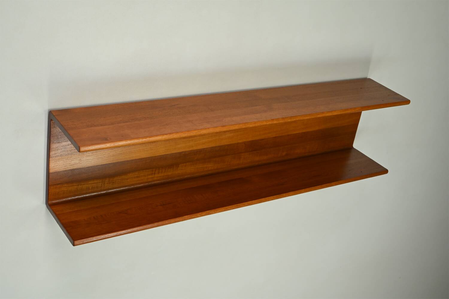 Solid teak wall shelf, 1960s Germany.