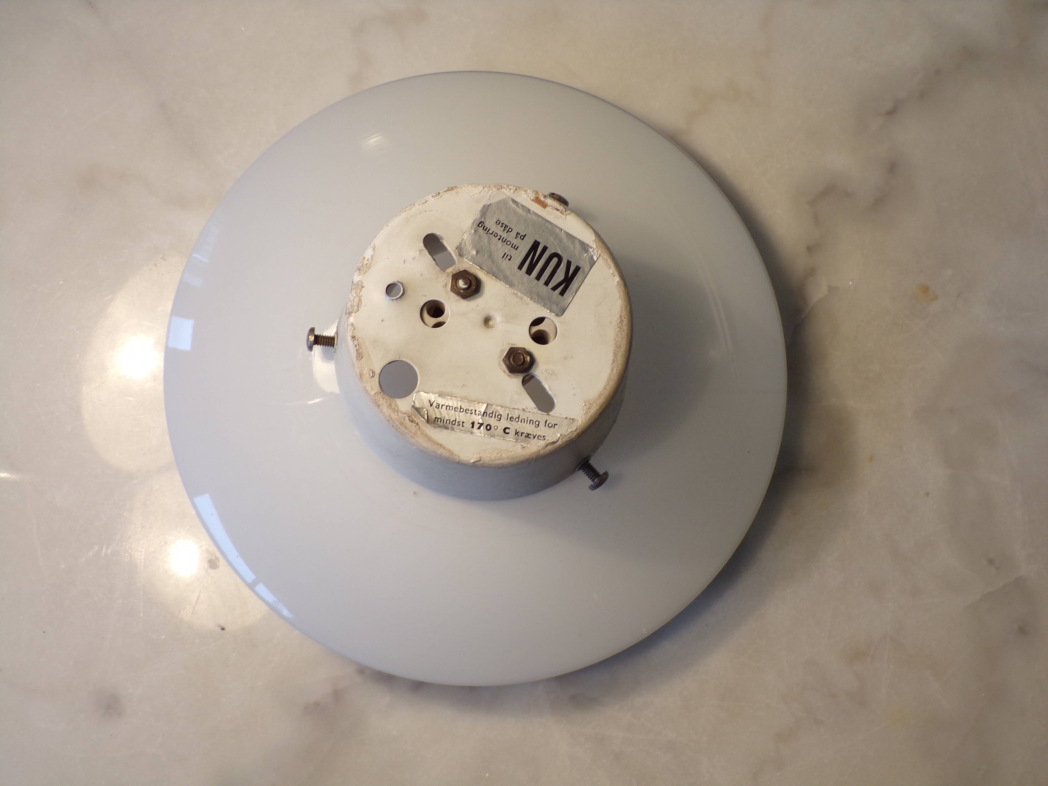 Aj eklipta wall light designed by arne jacobsen for louis poulsen