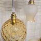 Suspension triple opaline with engraved and frosted glass in shades of yellow-orange.