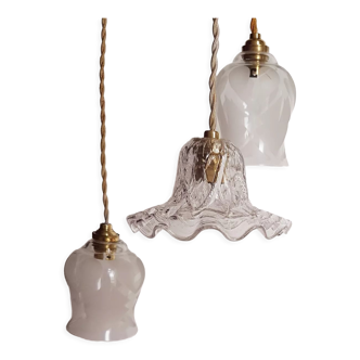 Suspension of portable lamps