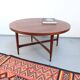 Vintage teak coffee table in 60s-70s style, retro style.