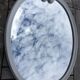 Oval mirror enamelled cast iron and its hook, circa 1950 39x49cm