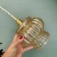 Vintage amber glass globe pendant light