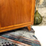 Vintage wooden cabinet with compass feet