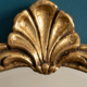 Small neo-baroque courtesy mirror with shell pediment – Patinated gilding