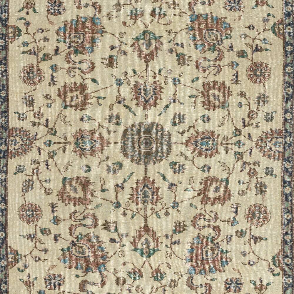 Authentic Vintage Turkish Beige Wool Area Rug with Floral Design. Hand-knotted in Turkey