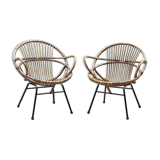 Pair of rattan shell chairs with metallic feet