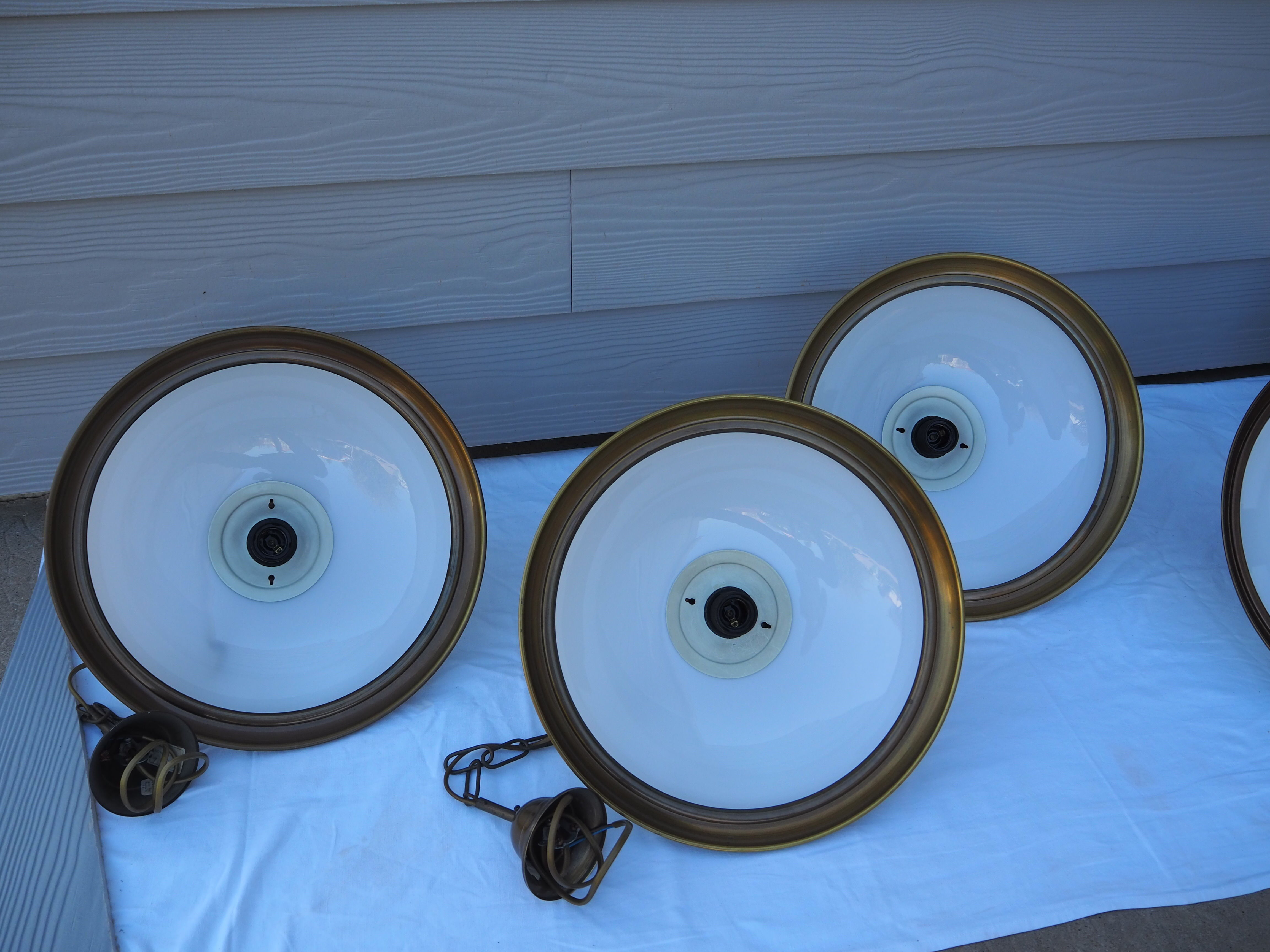 Suspension in white opaline, its edge in aged brass