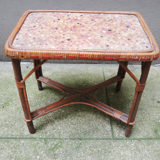 Desk with rattan and wicker armchair for children