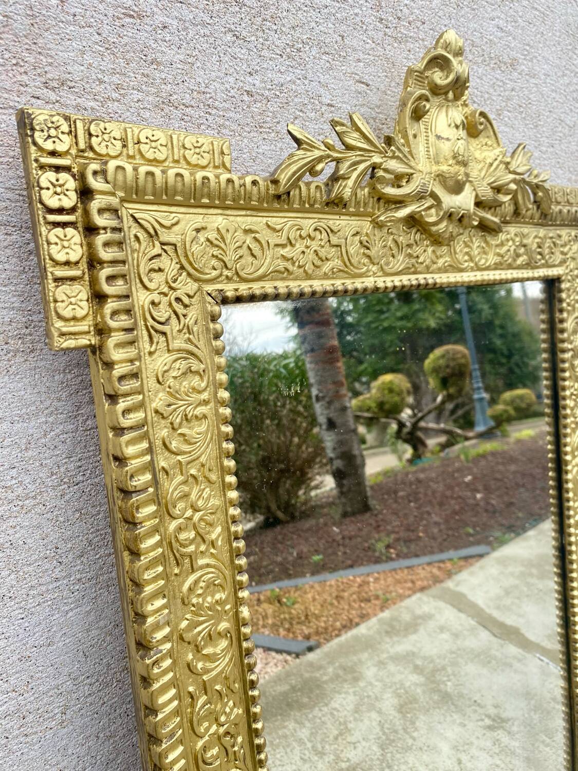 Two antique 19th century mirrors in carved Napoleon oak wood