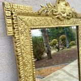 Two antique 19th century mirrors in carved Napoleon oak wood
