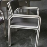 Dining table set and 4 dining chairs by Pierre Mennen for Pastoe.