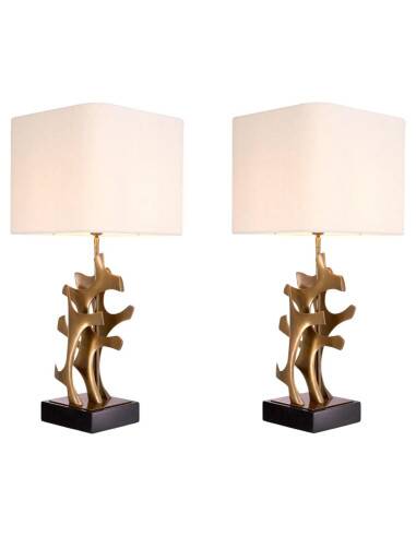 Pair of patinated brass table lamps with black granite base.