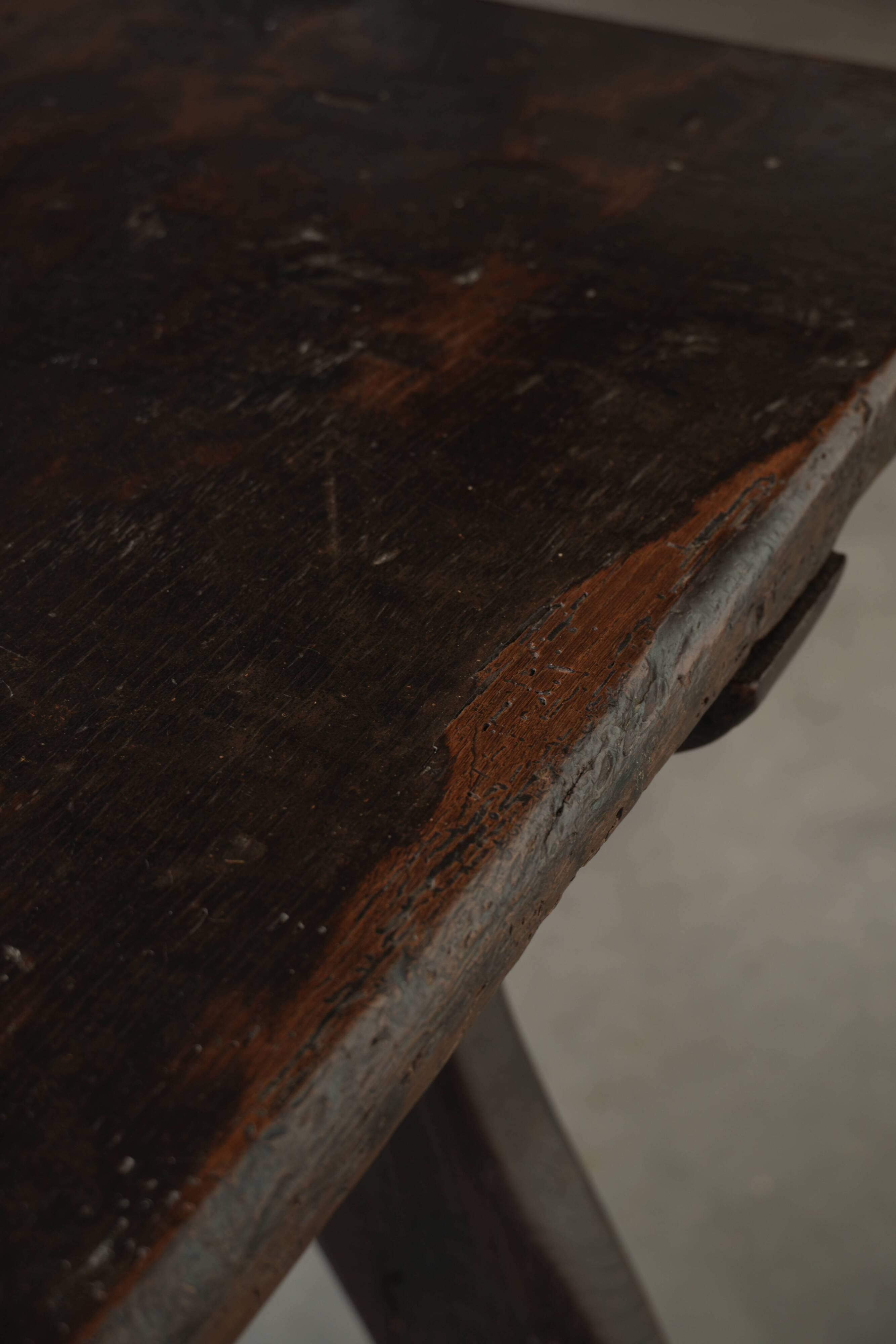 Antique Spanish table from the early 18th century with  a cast iron base