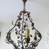 Brass chandelier and porcelain flowers