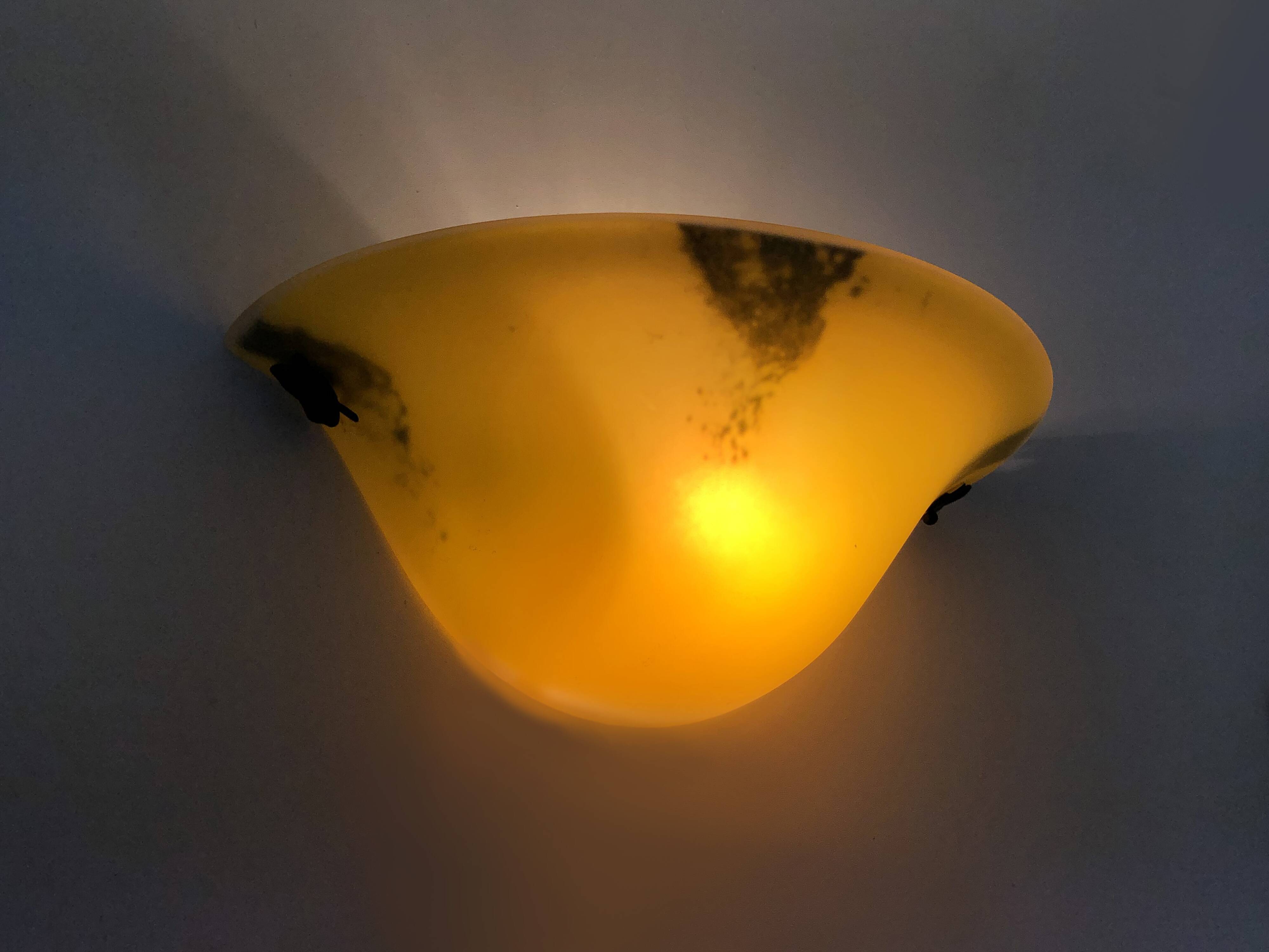 Pair of half-moon wall sconces in yellow glass paste and glass. Year 80 90