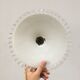 Pair of white opaline suspensions with serrated edges