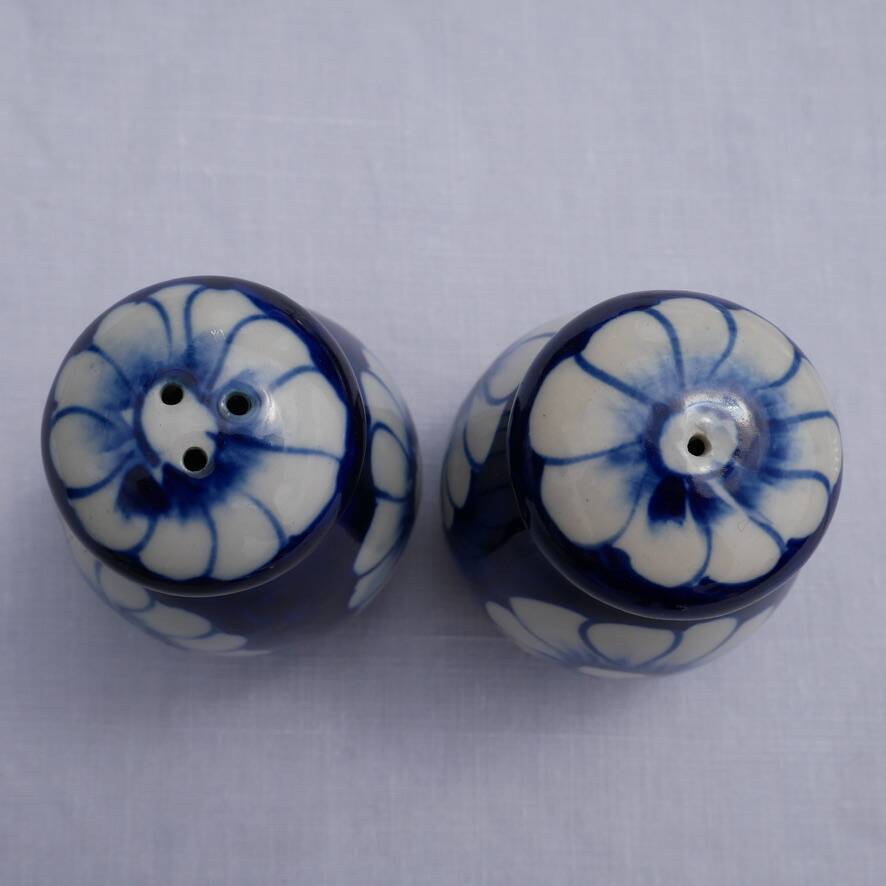 Blue ceramic salt and pepper shaker with flower pattern