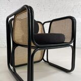 Cubic armchair in black rattan and canework