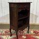 Oak accent furniture bookshelf with a drawer, early 20th century work.