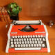 Portable typewriter " Olympia traveller de luxe " , red , in working order