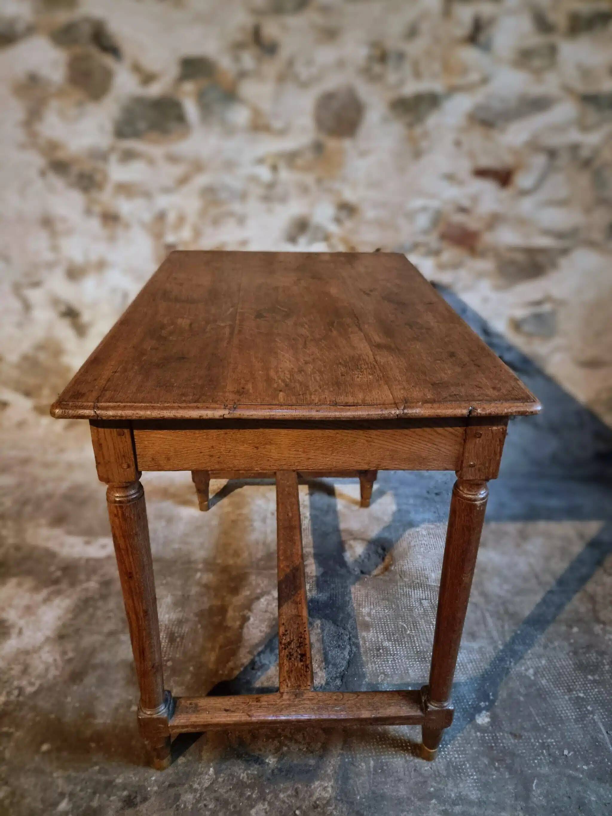 Antique French oak table, writing table from the early 19th century.