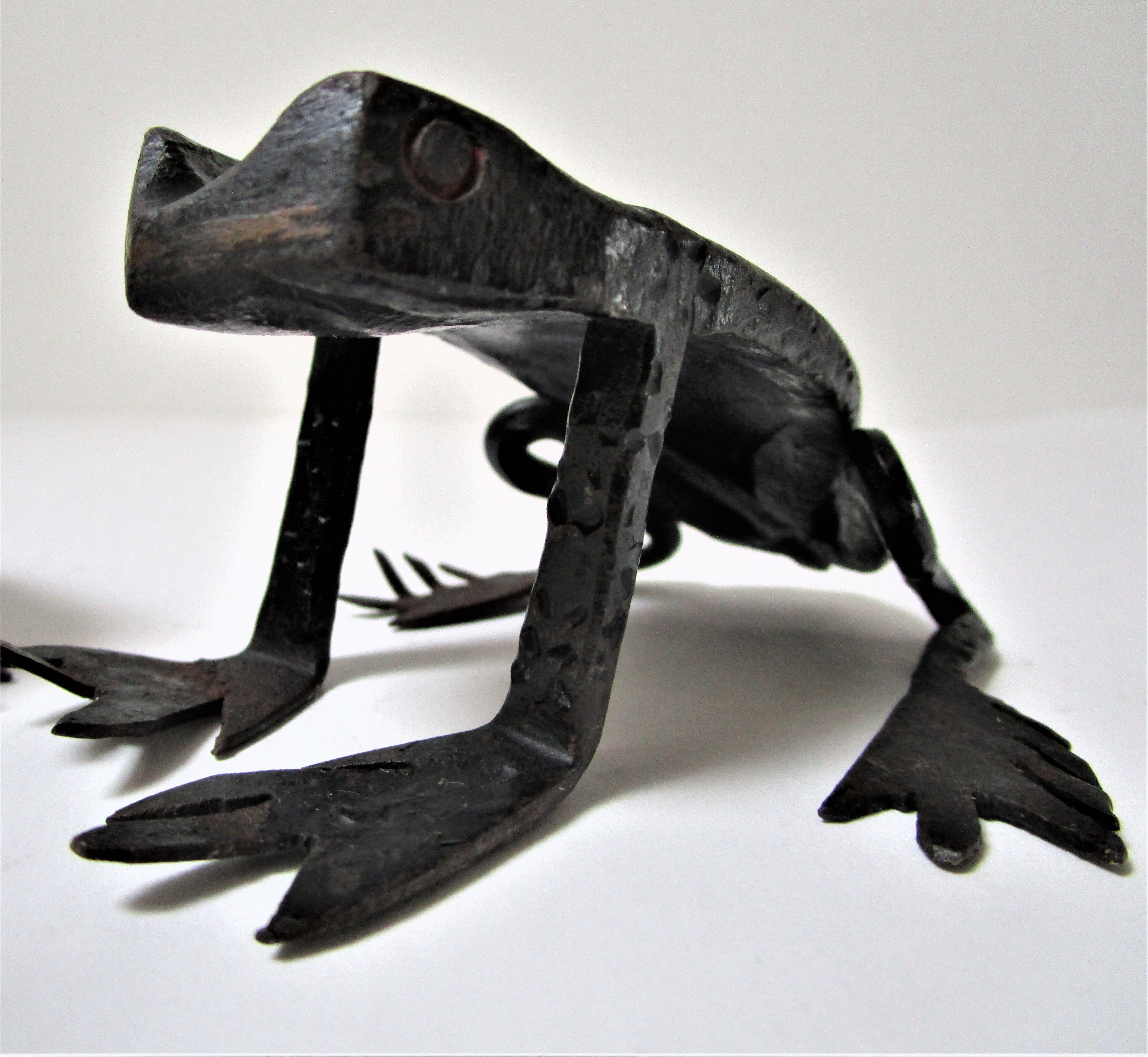 Two metal clipboard frogs patinated vintage brutalist