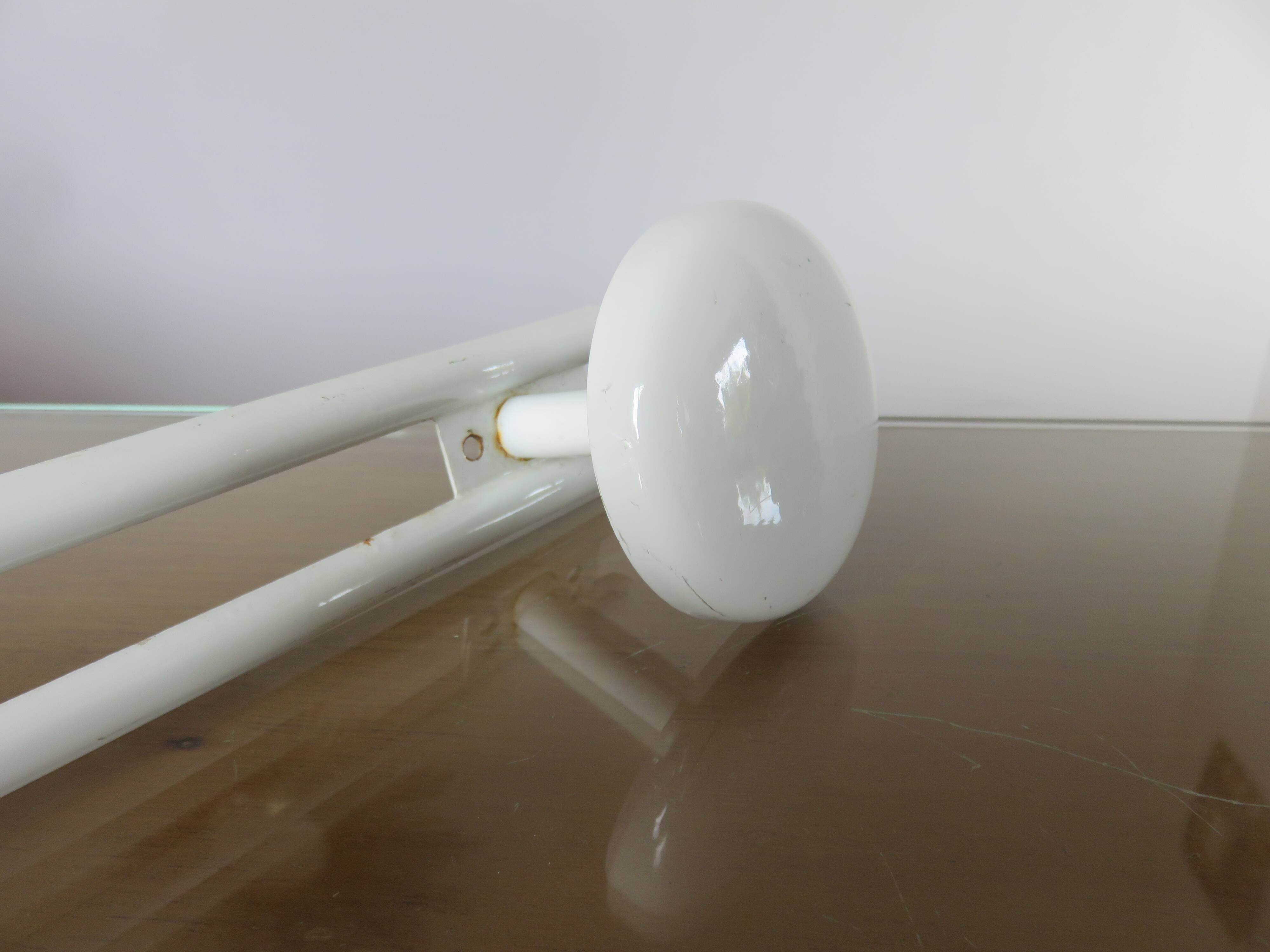 White lacquered metal wall coat rack with 3 hooks, 1970.