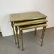 Nested brass tables, attributed to Maison Baguès, France, 1950–60.
