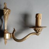 Applique murale en laiton une flamme