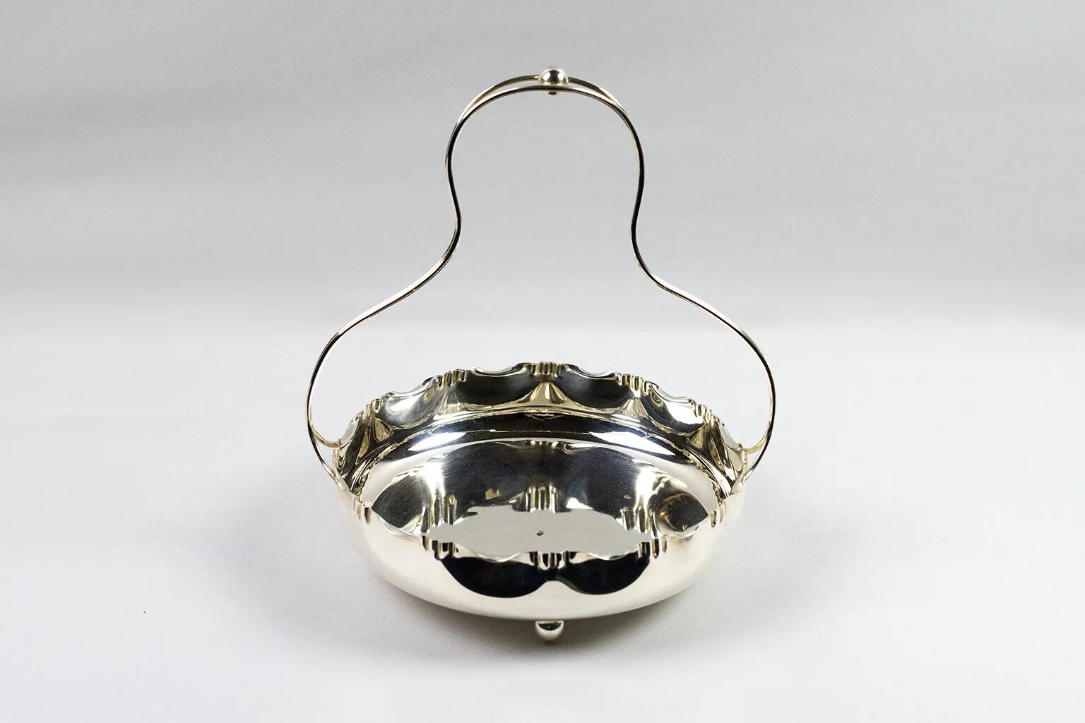 Hallmarked silver-plated metal centerpiece with handle