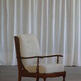 Modern Danish design, a pair of high-backed armchairs in oak and lambswool, 1950s.