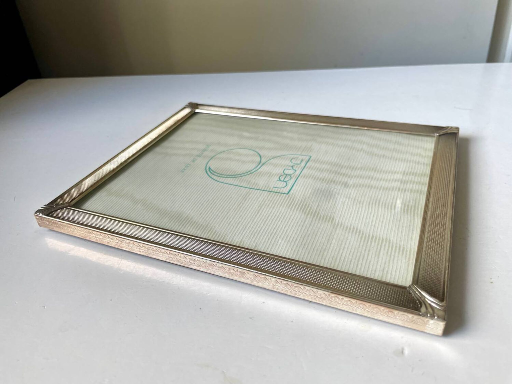 Art deco silver colored   frame 28.5 cm x 14.5 cm  convex glass