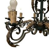 Louis XV style chandelier in wrought and hammered iron 20th century