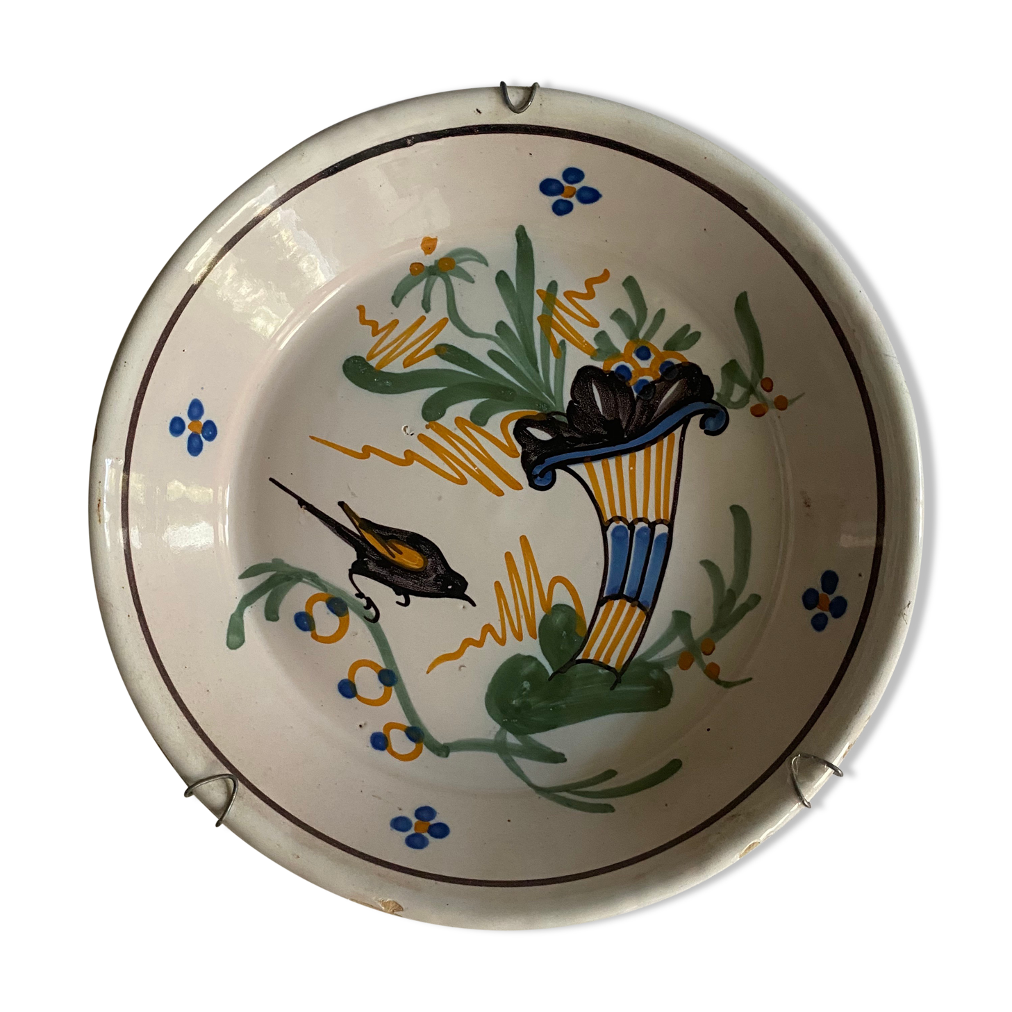 Plate of Nevers in earthenware late eighteenth century decoration of cornucopia